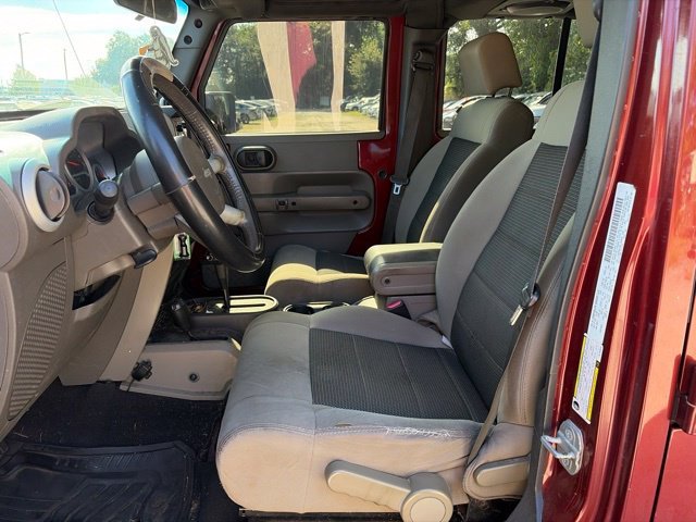 Used 2010 Red Jeep Unlimited Sahara image 25