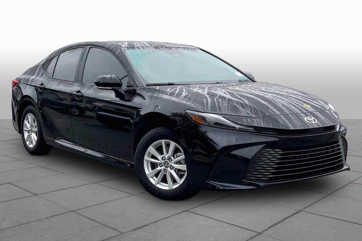Used 2025 Midnight Black Metallic Toyota LE image 2