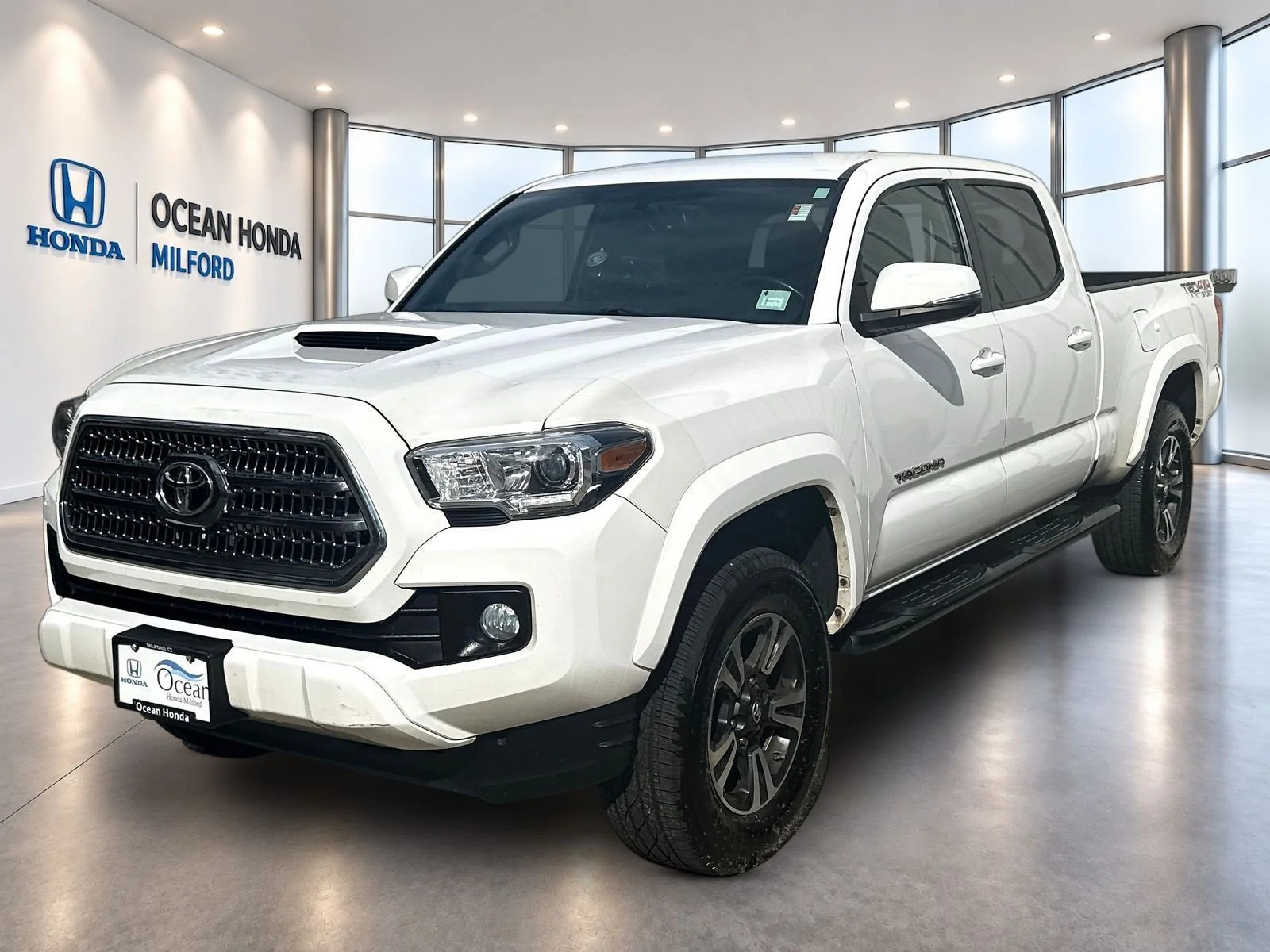 Used 2016 Super White Toyota TRD Sport image 1