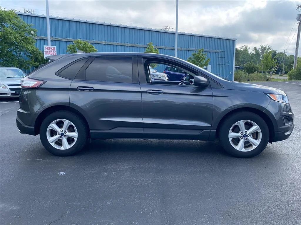 Used 2015 Magnetic Metallic Ford SE image 11