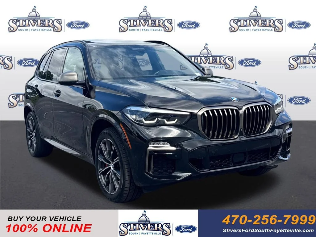 Used 2021 Black BMW M50i image 1