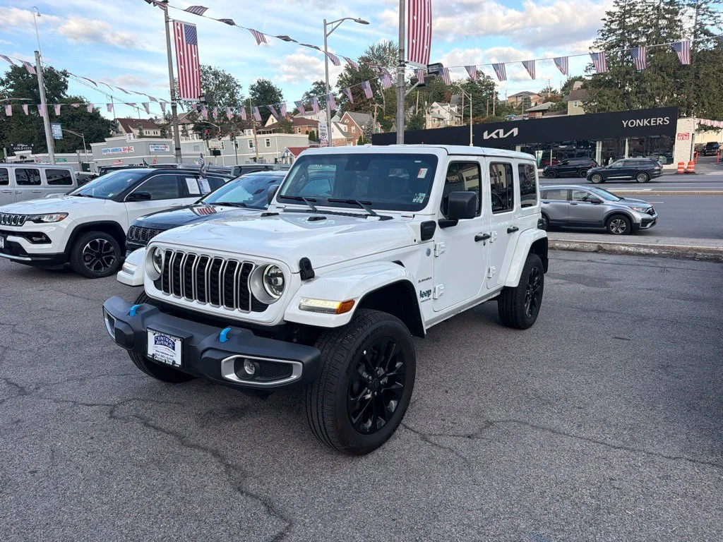 Used 2024 White Jeep Sahara 4xe image 1
