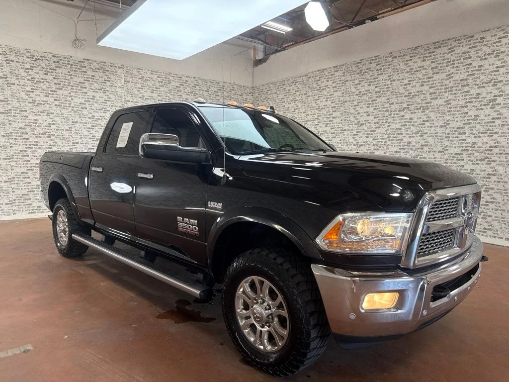Used 2017 Brilliant Black Crystal Pearlcoat Ram Laramie image 1