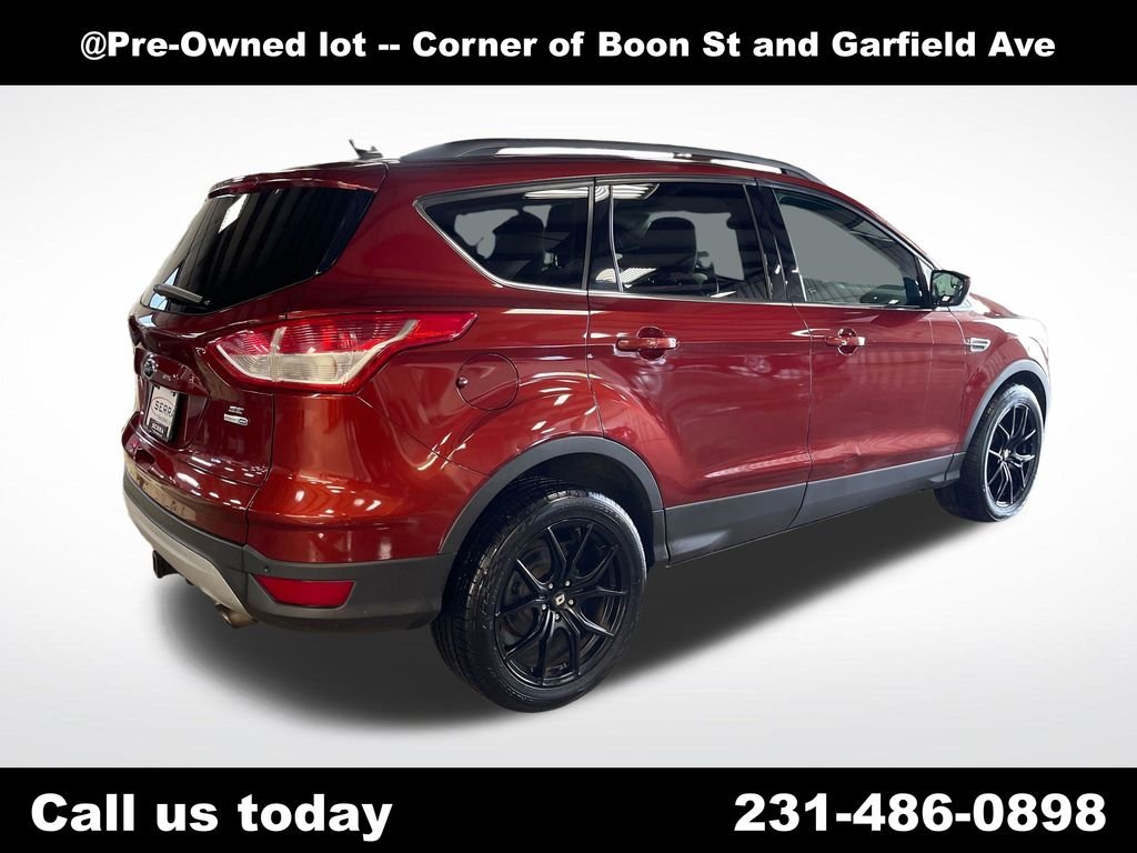 Used 2014 Orange Ford SE image 5