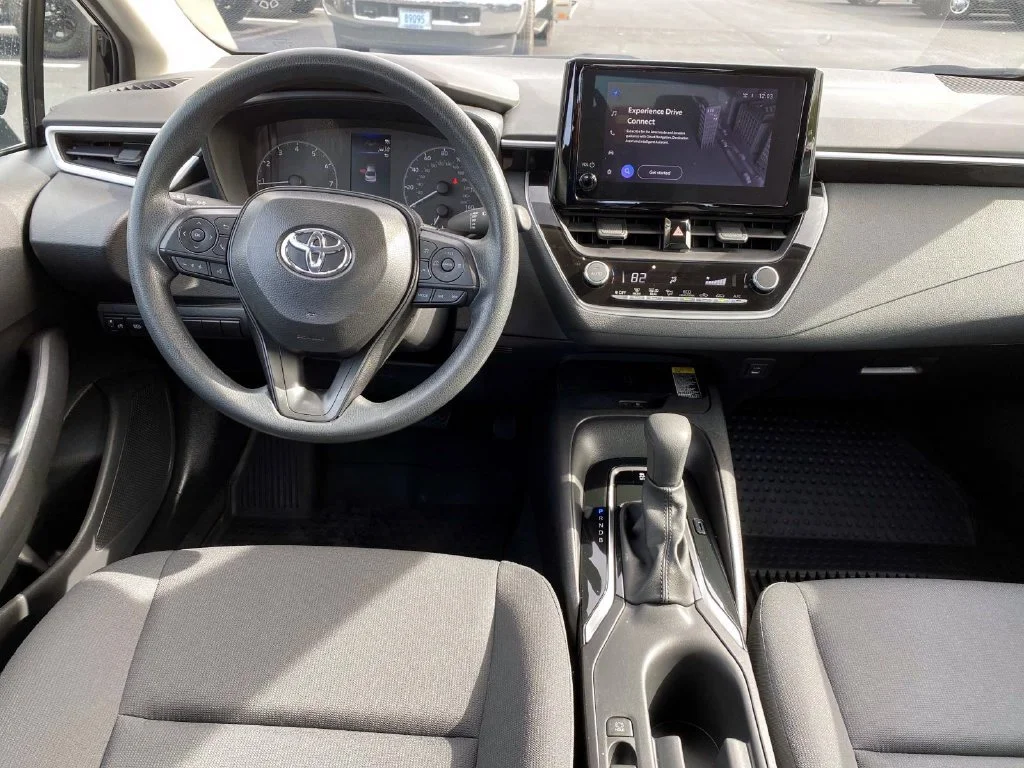 Used 2025 Midnight Black Metallic Toyota LE image 9