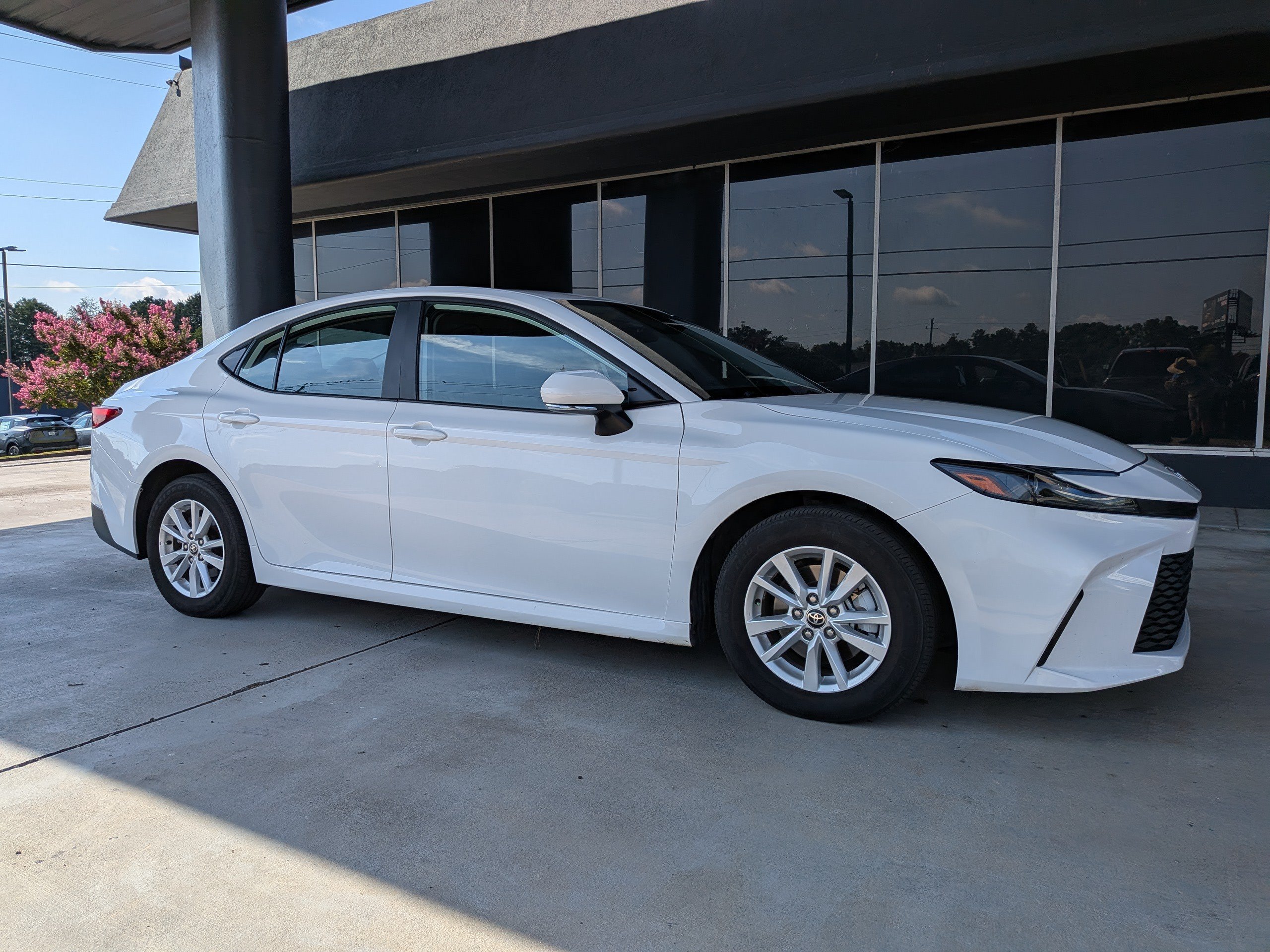 Used 2025 White Toyota LE image 1