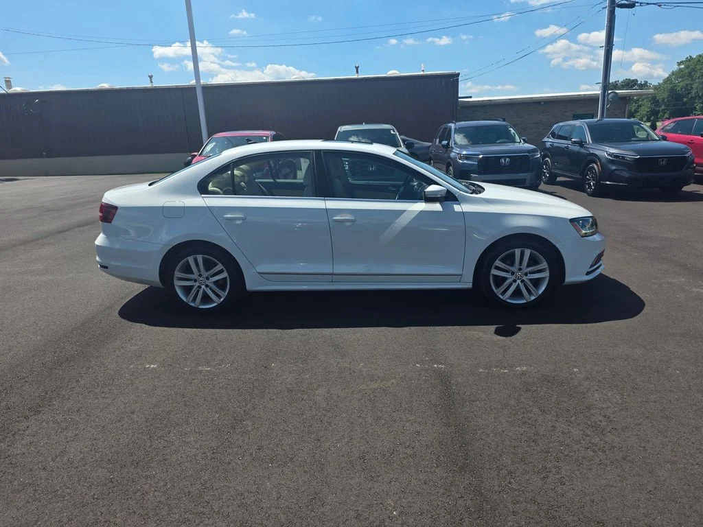 Used 2017 Volkswagen Jetta SEL with VIN 3VWL17AJ5HM319989 for sale in Dover, OH