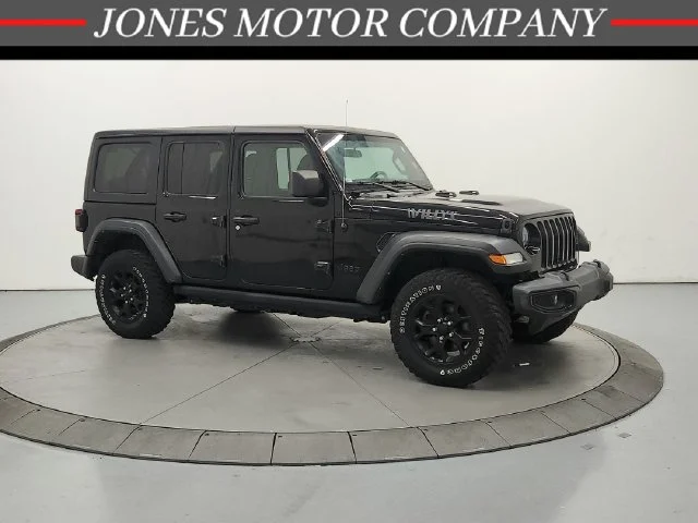 Used 2021 Black Clearcoat Jeep Unlimited Willys image 1