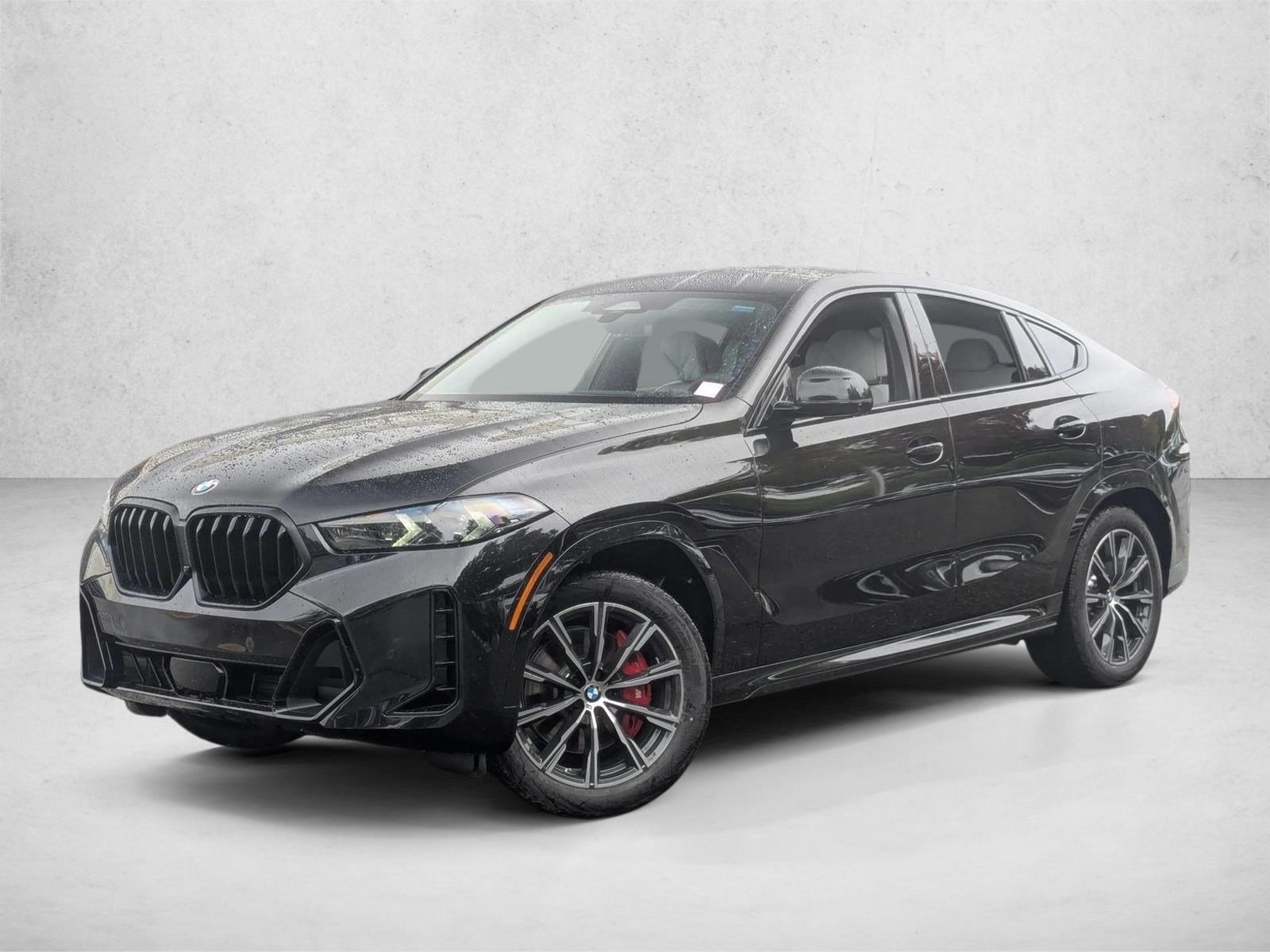 Used 2026 Black Sapphire Metallic BMW xDrive40i image 1