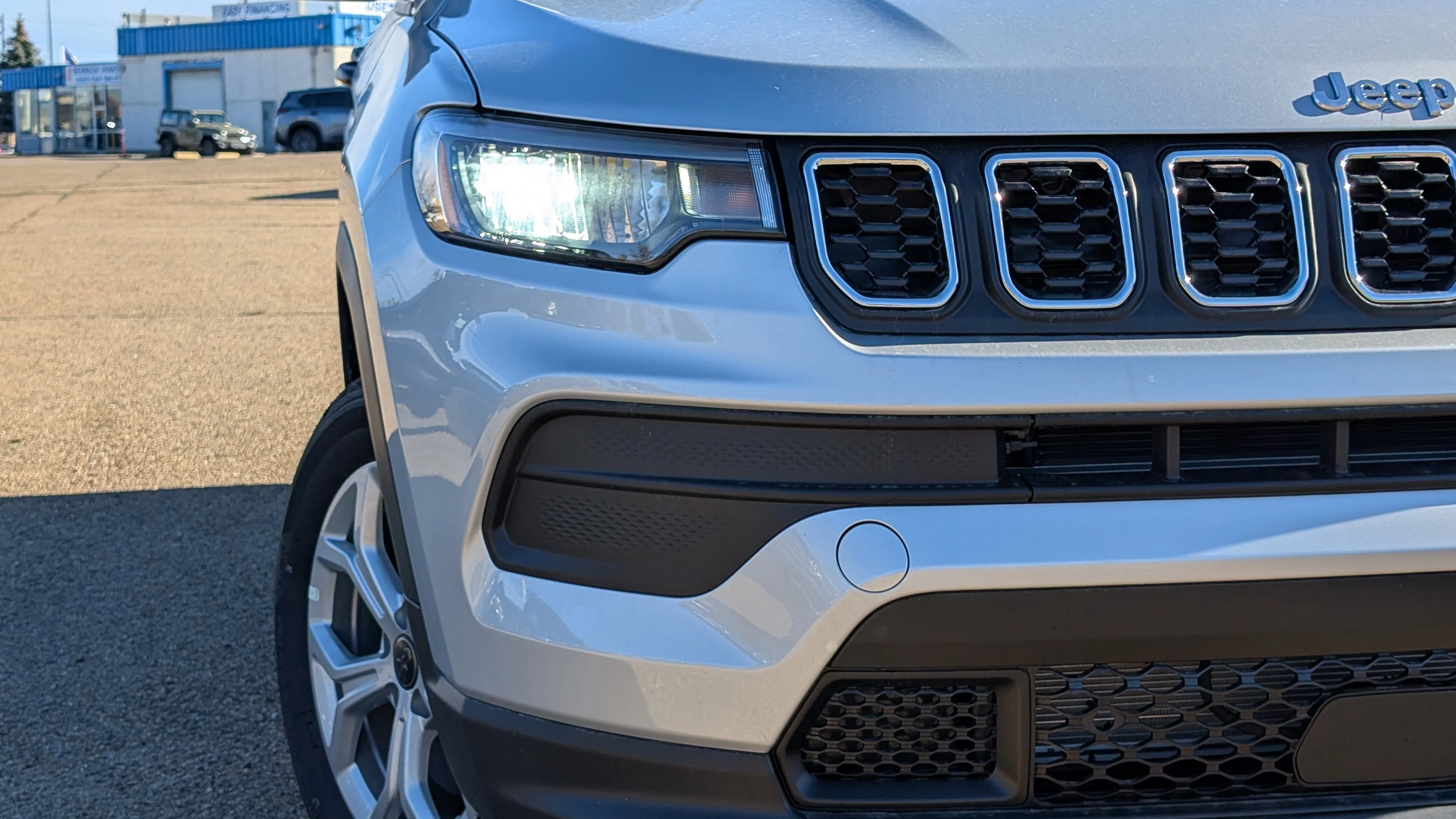 New 2026 Silver Zynith Metallic Jeep Sport image 11