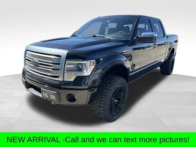 Used 2014 Black Ford Platinum image 1