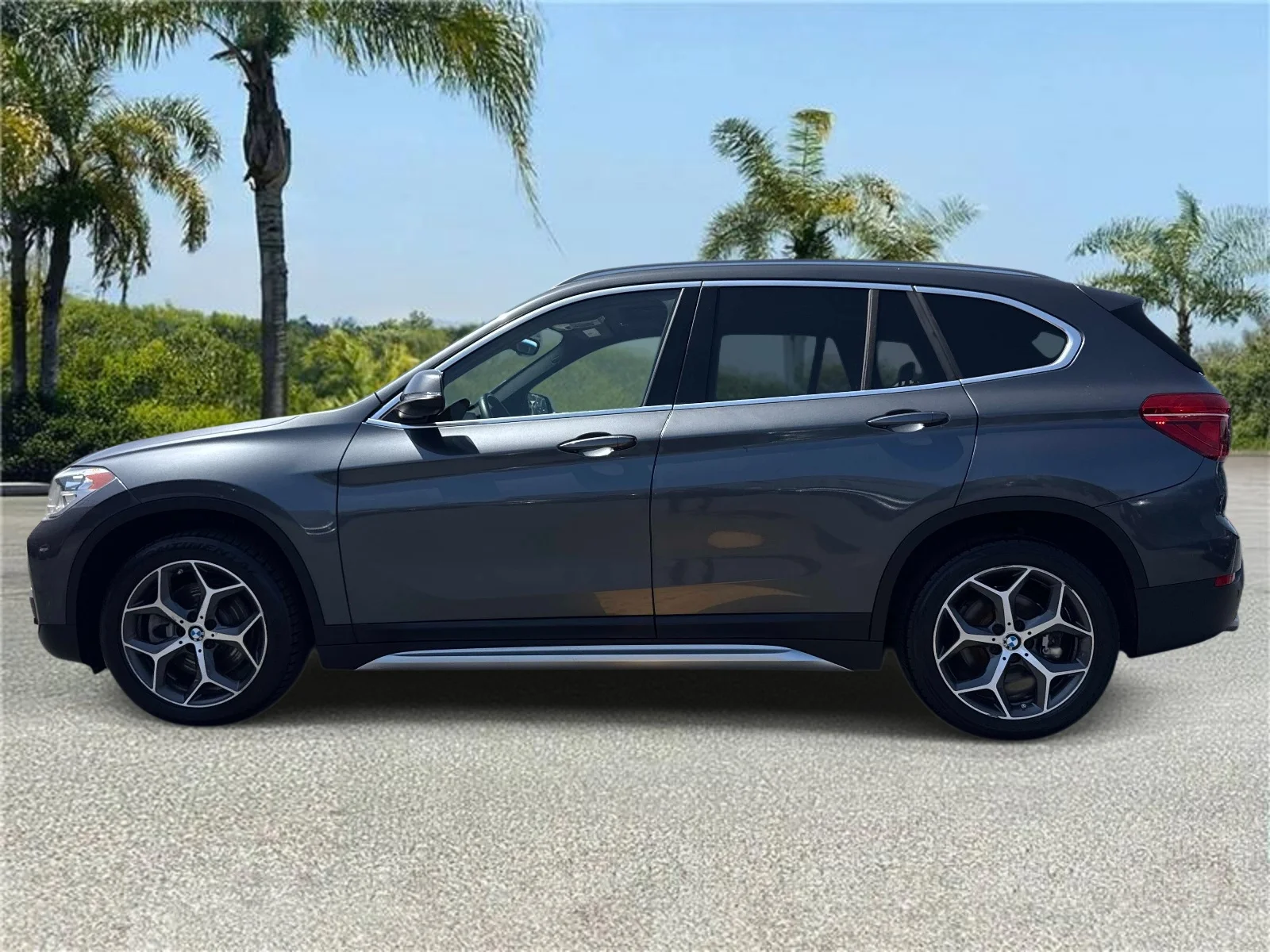 Used 2019 BMW X1 28i with VIN WBXHU7C55K3H46068 for sale in Downey, CA
