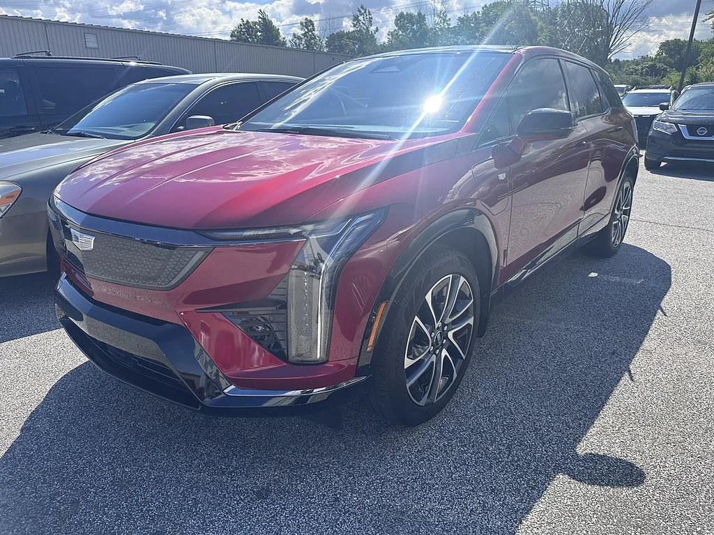 Used 2025 Radiant Red Tintcoat Cadillac Sport 1 image 1