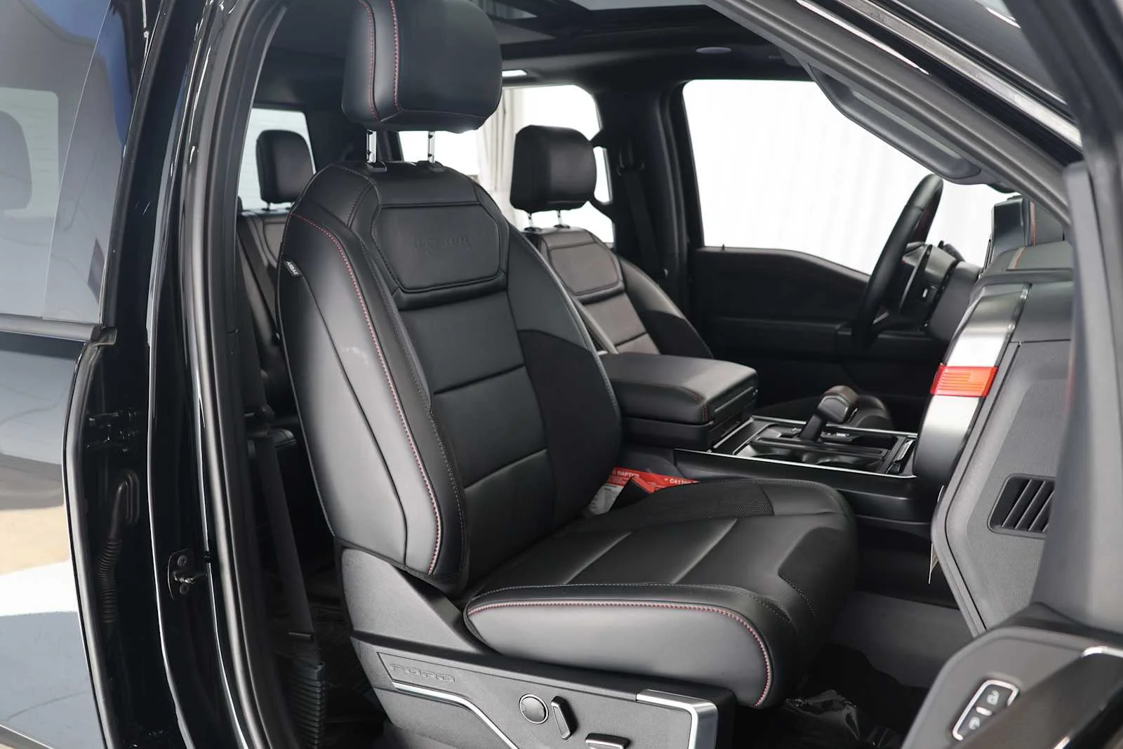 Used 2025 Agate Black Metallic Ford Raptor image 14
