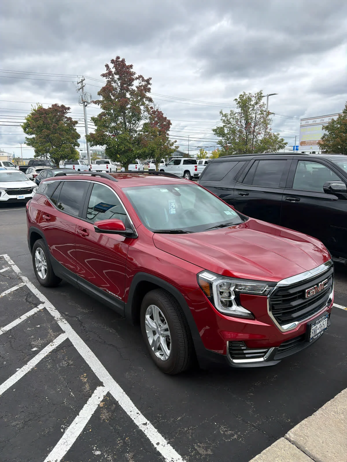 Used 2024 Volcanic Red Tintcoat GMC SLE image 2
