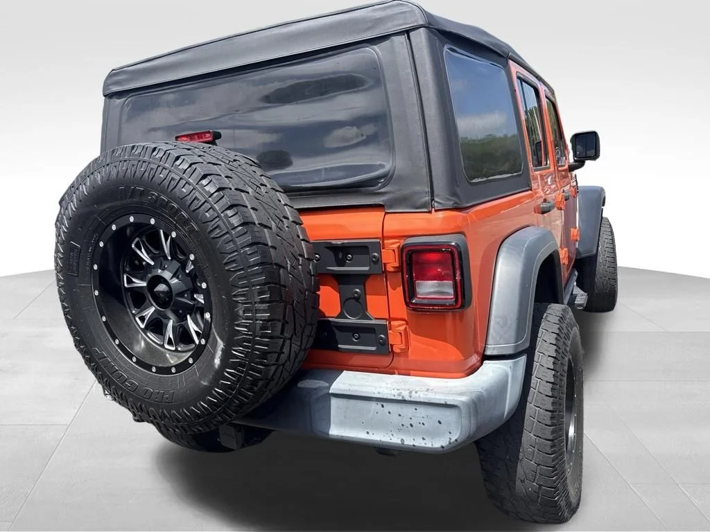 Used 2019 Orange Jeep Unlimited Sport image 16
