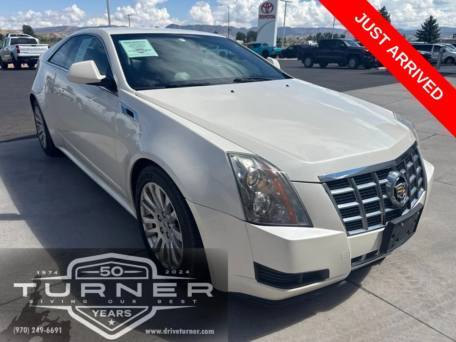 Used 2014 White Cadillac Base image 1