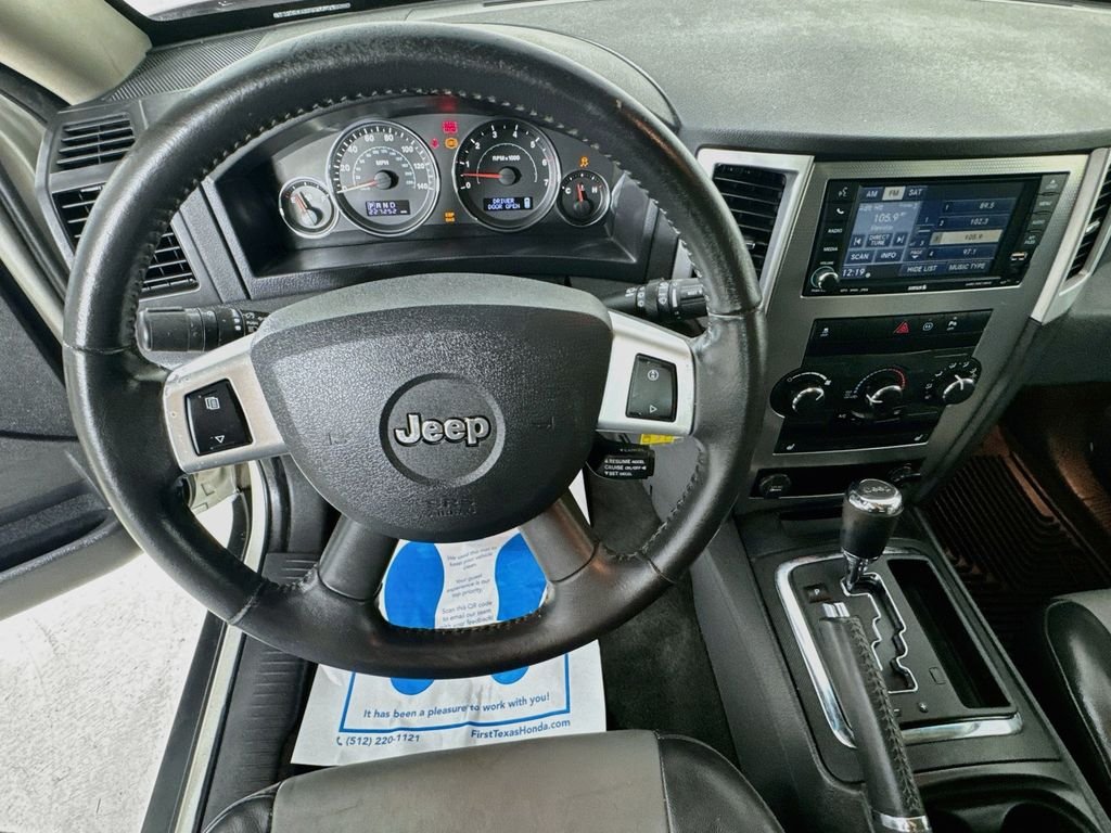 Used 2010 Light Graystone Pearlcoat Jeep Laredo image 12