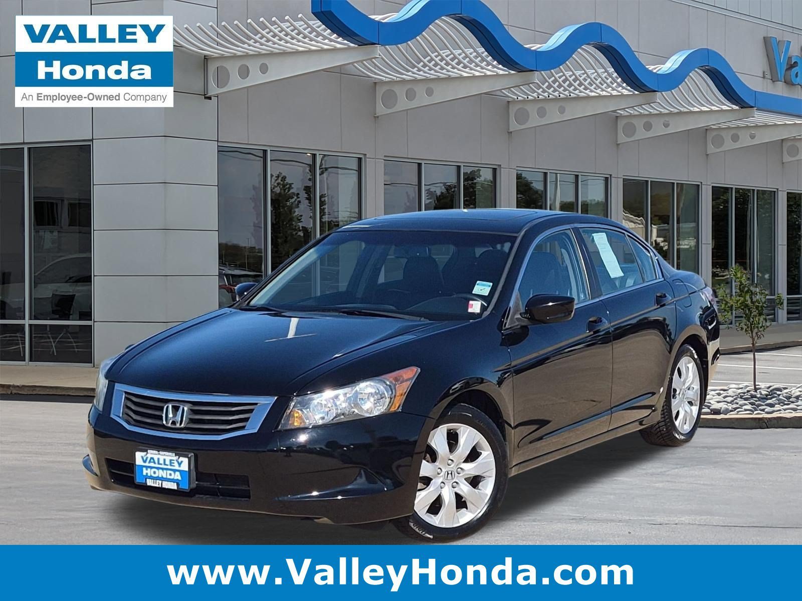 Used 2010 Crystal Black Pearl Honda EX-L Sedan image 1