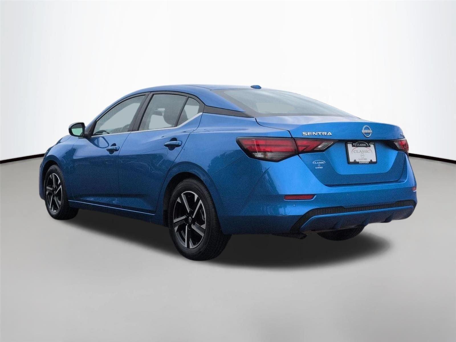 Used 2024 Electric Blue Metallic Nissan SV image 3