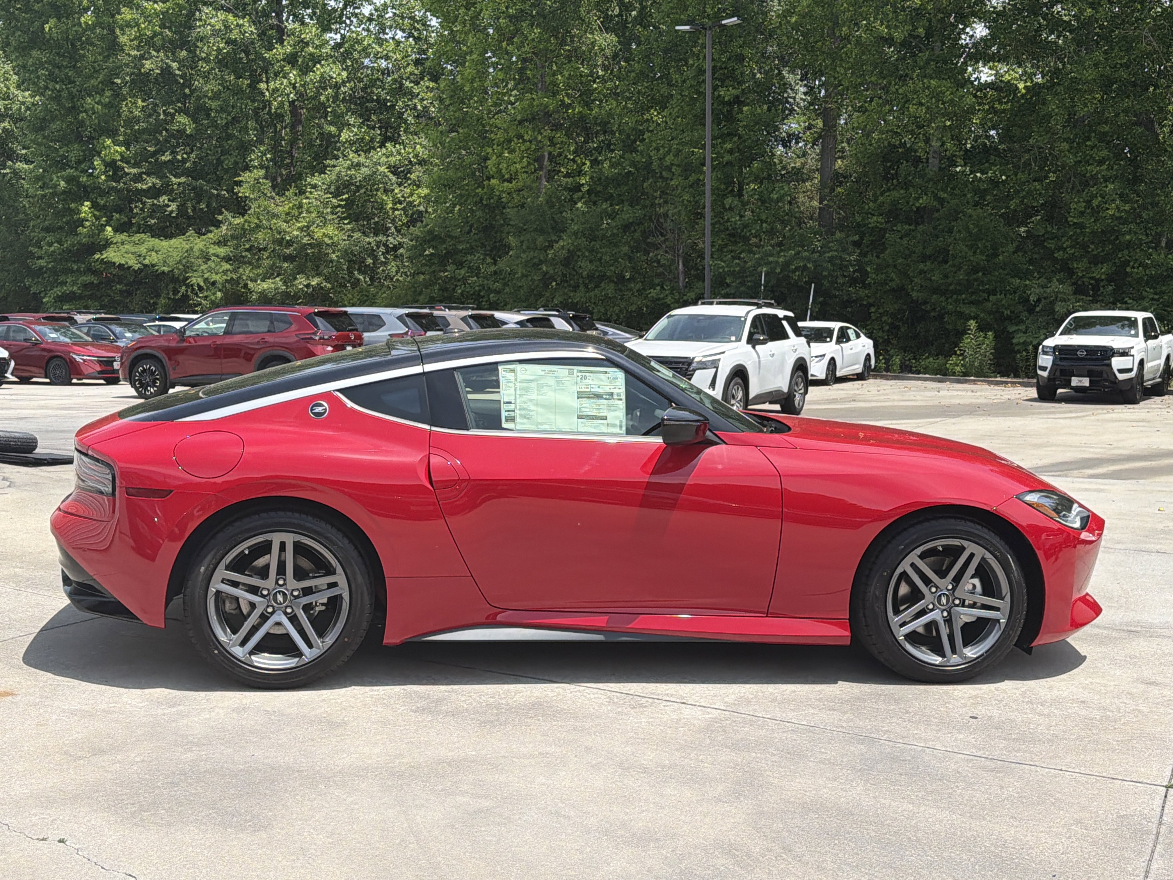 New 2026 Solid Red/Super Black Nissan Sport image 9