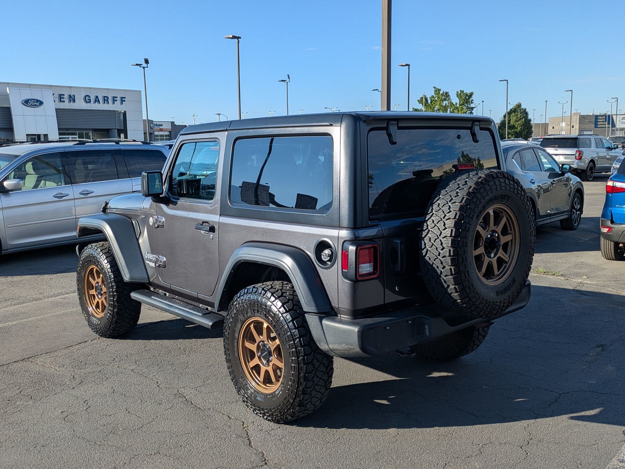 Used 2018 Granite Crystal Clearcoat Metallic Jeep Sport S image 5