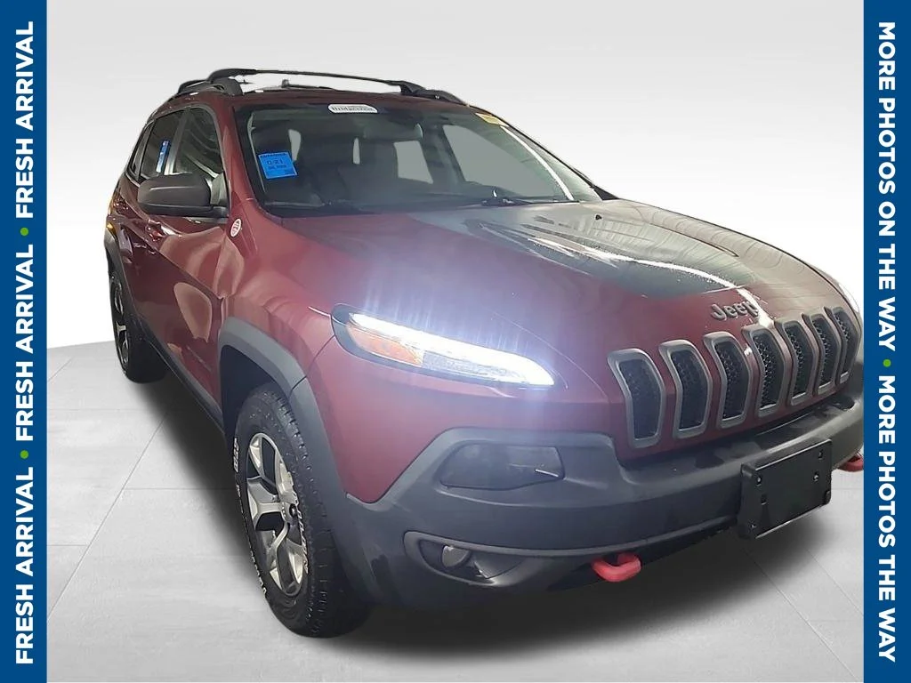 Used 2014 Red Jeep Trailhawk image 1