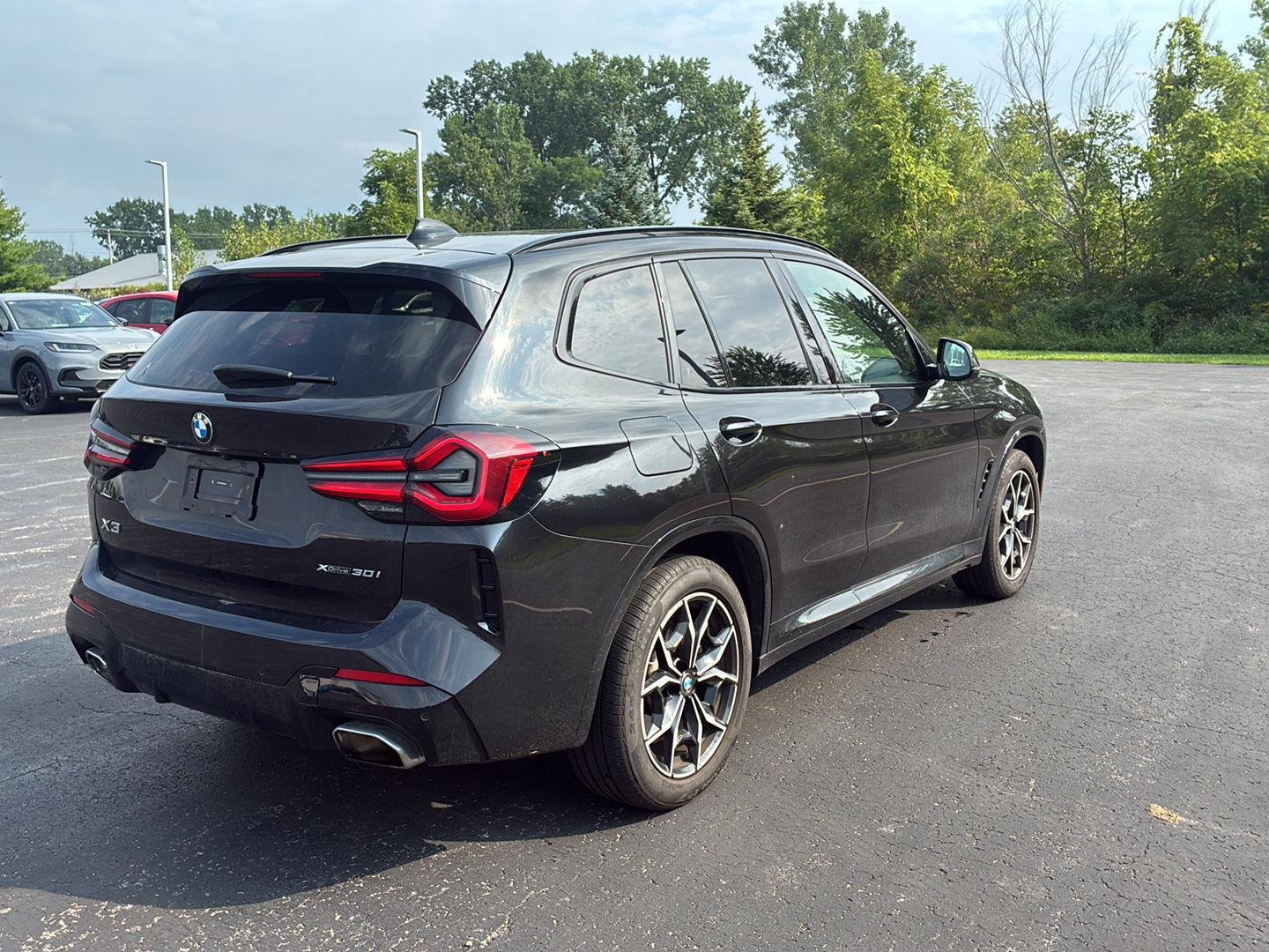 Used 2024 Black Sapphire Metallic BMW xDrive30i image 22