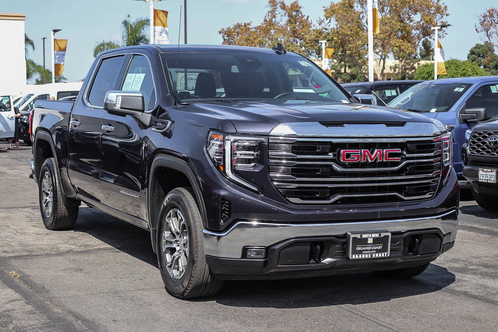 Used 2025 Titanium Rush Metallic GMC SLT image 3
