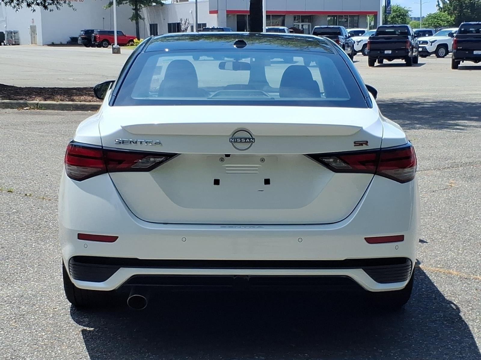 Used 2025 Aspen White Tricoat/Super Black Nissan SR image 13