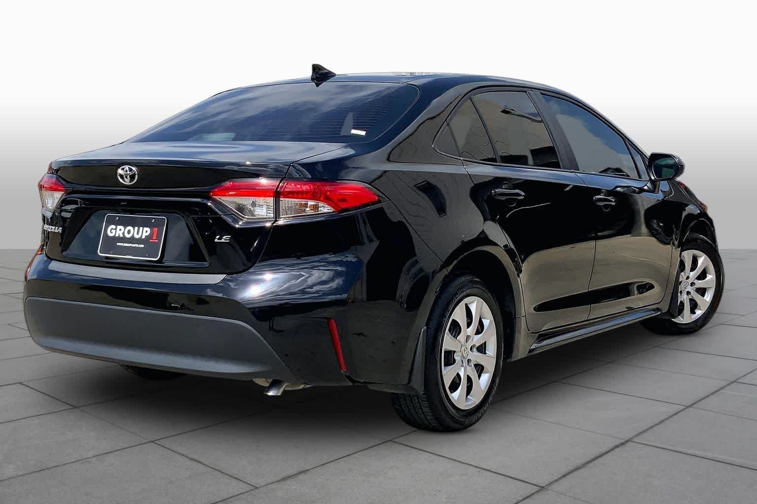 Used 2025 Midnight Black Metallic Toyota LE image 13