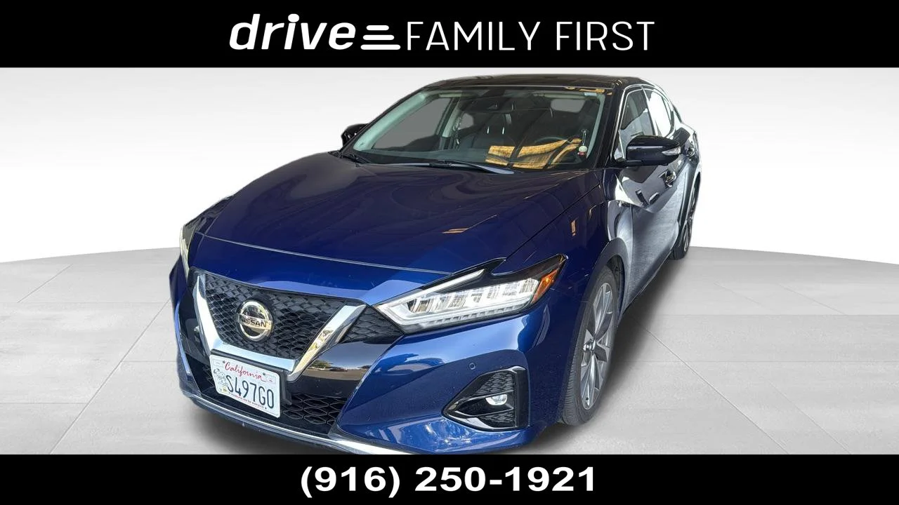 Used 2020 Deep Blue Pearl Nissan Platinum image 1