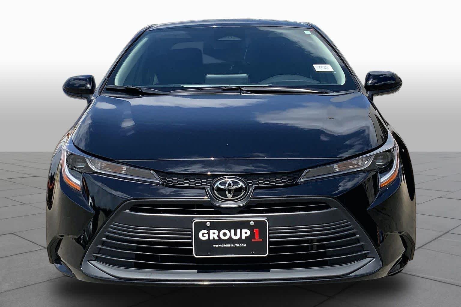 Used 2025 Midnight Black Metallic Toyota LE image 4