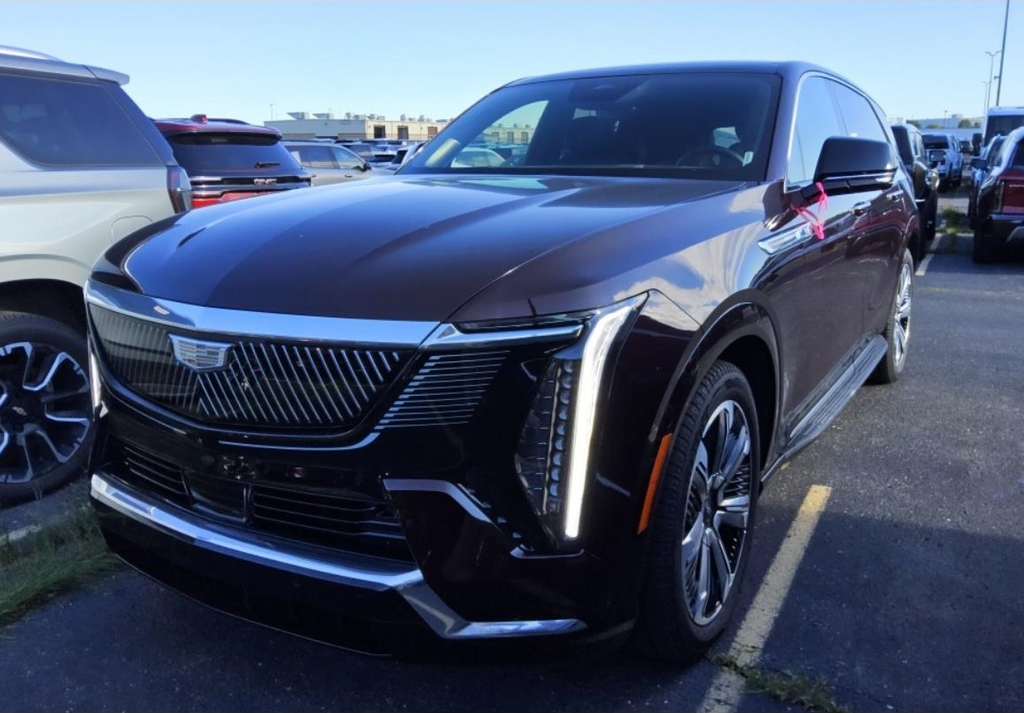 Used 2025 Red Cadillac Luxury 2 image 1