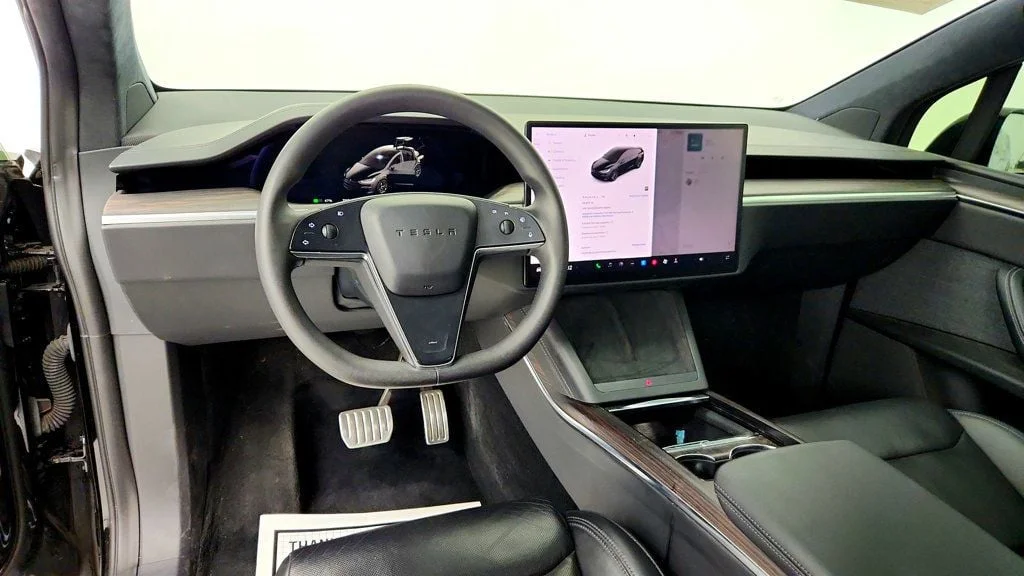 Used 2023 Solid Black Tesla AWD image 11