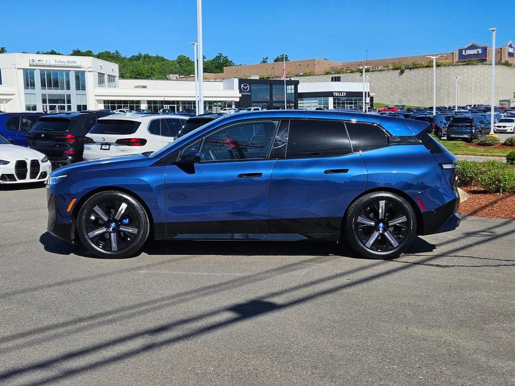 Certified Used 2025 Blue BMW xDrive50 image 4