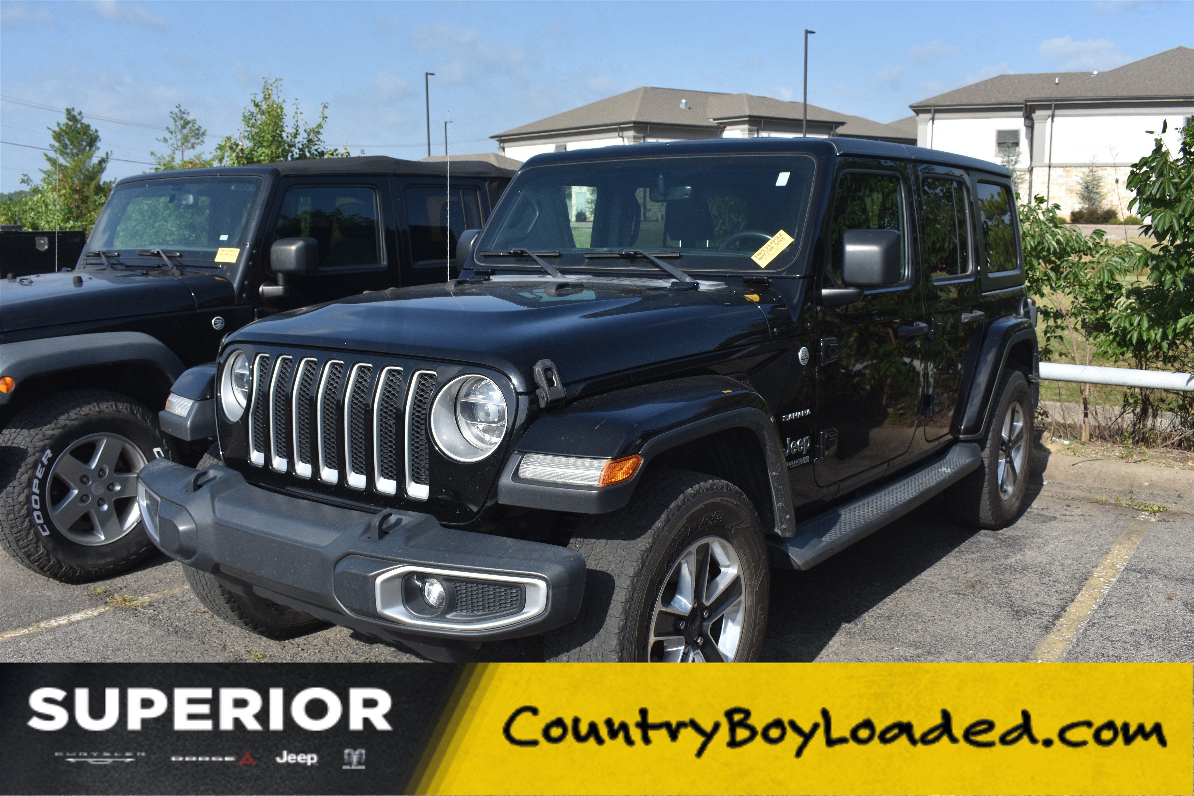 Used 2018 Black Clearcoat Jeep Sahara image 1