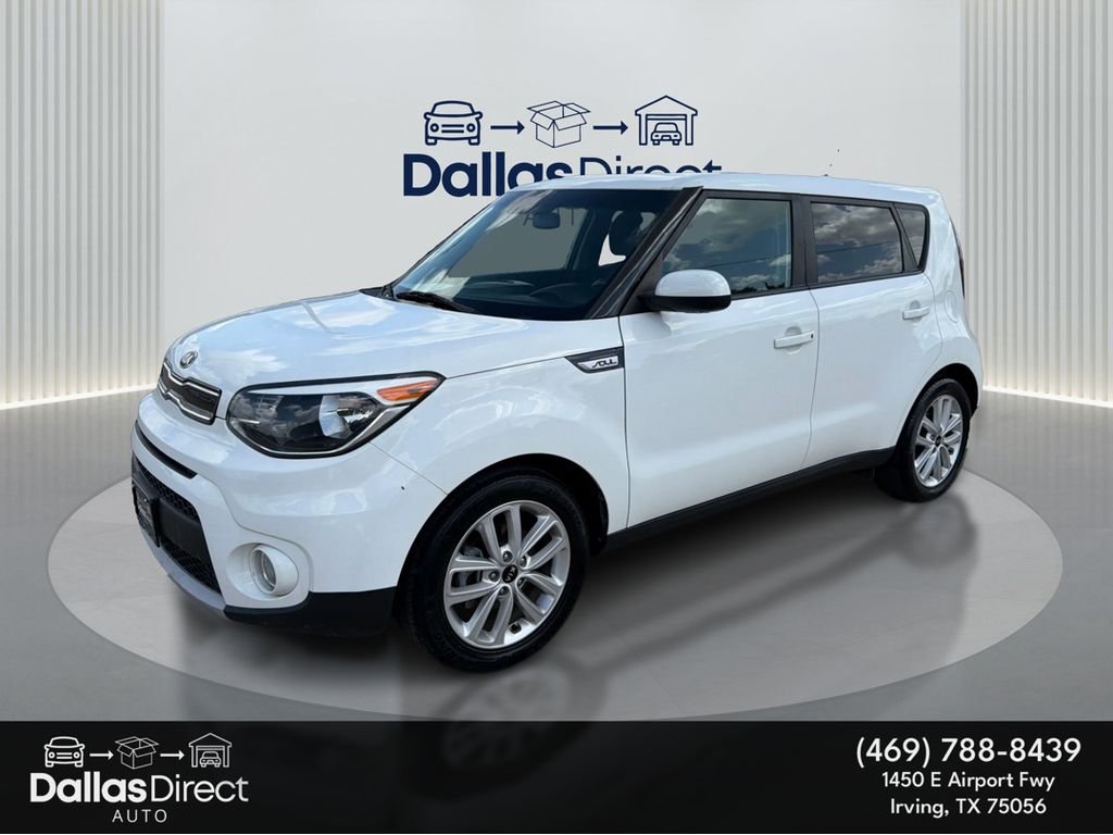 Used 2019 Clear White Kia + image 1