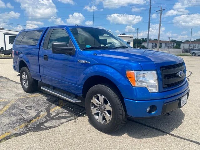 Used 2013 Blue Flame Metallic Ford STX image 4