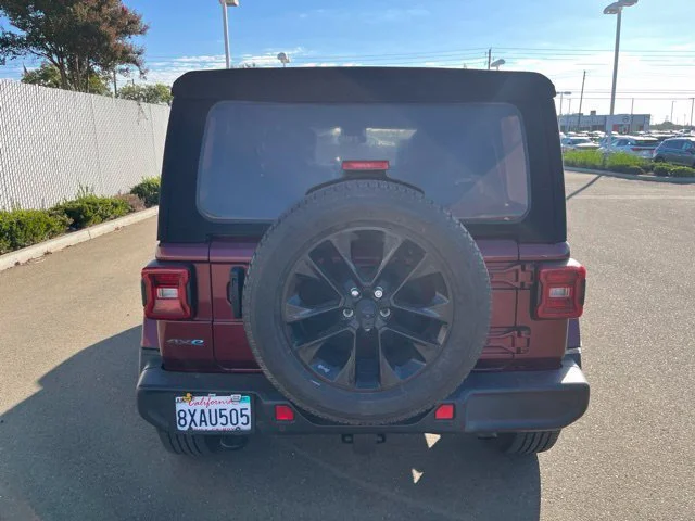 Used 2021 Snazzberry Pearlcoat Jeep Unlimited Sahara image 4