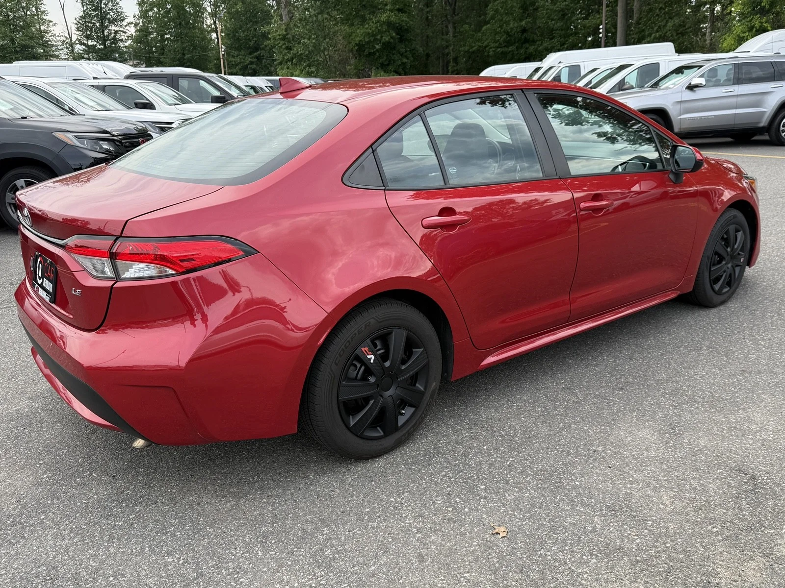 Used 2021 Barcelona Red Metallic Toyota LE image 7