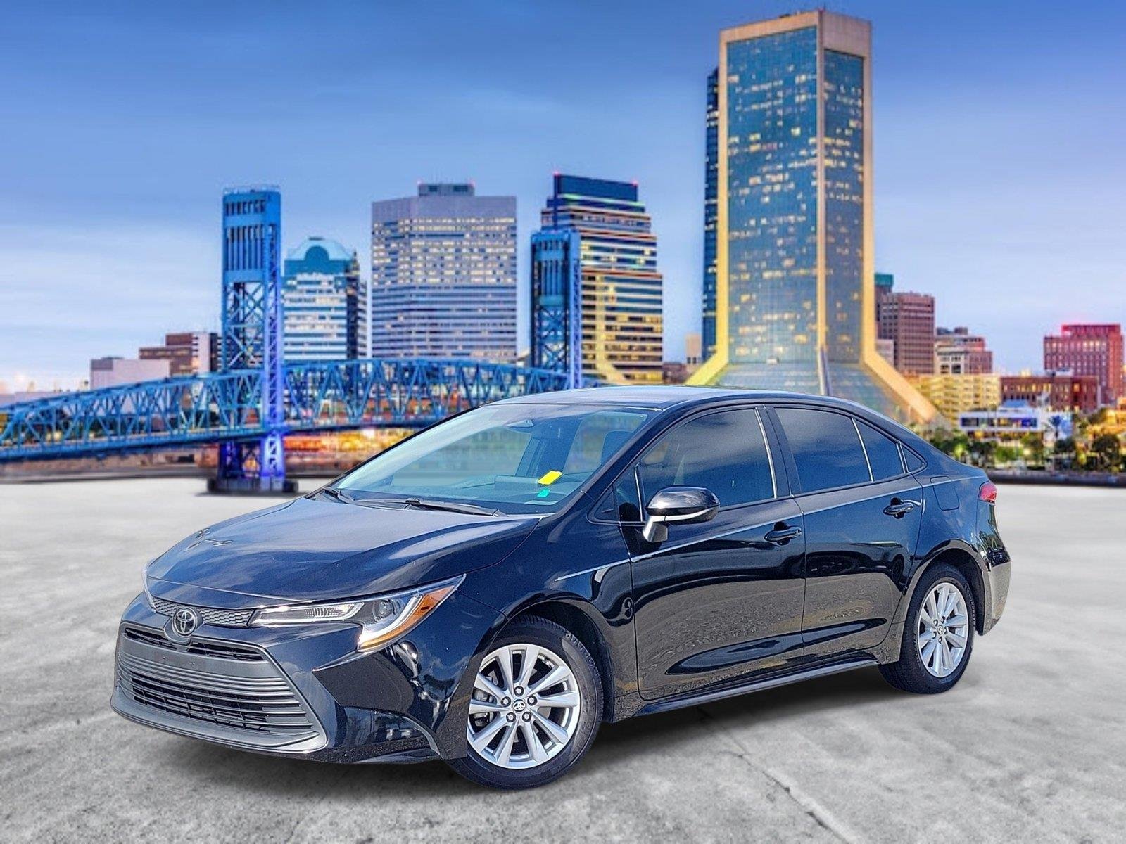 Used 2024 Midnight Black Metallic TOYOTA LE image 1