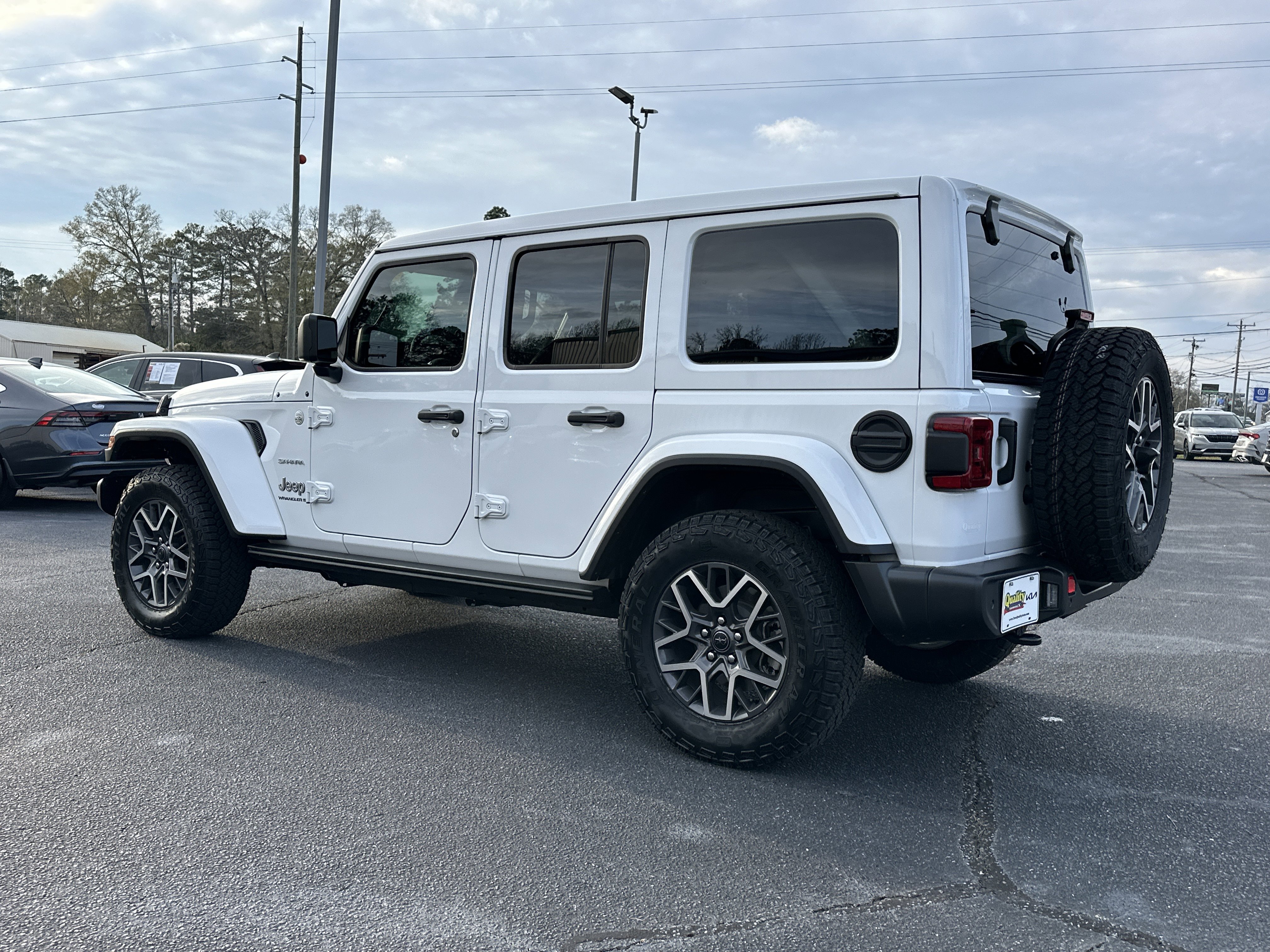 Used 2024 Bright White Clearcoat Jeep Sahara image 6