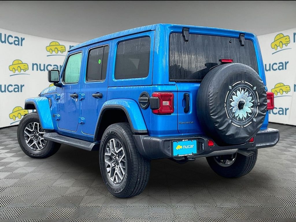 Used 2025 Hydro Blue Pearl Coat Jeep Sahara image 4