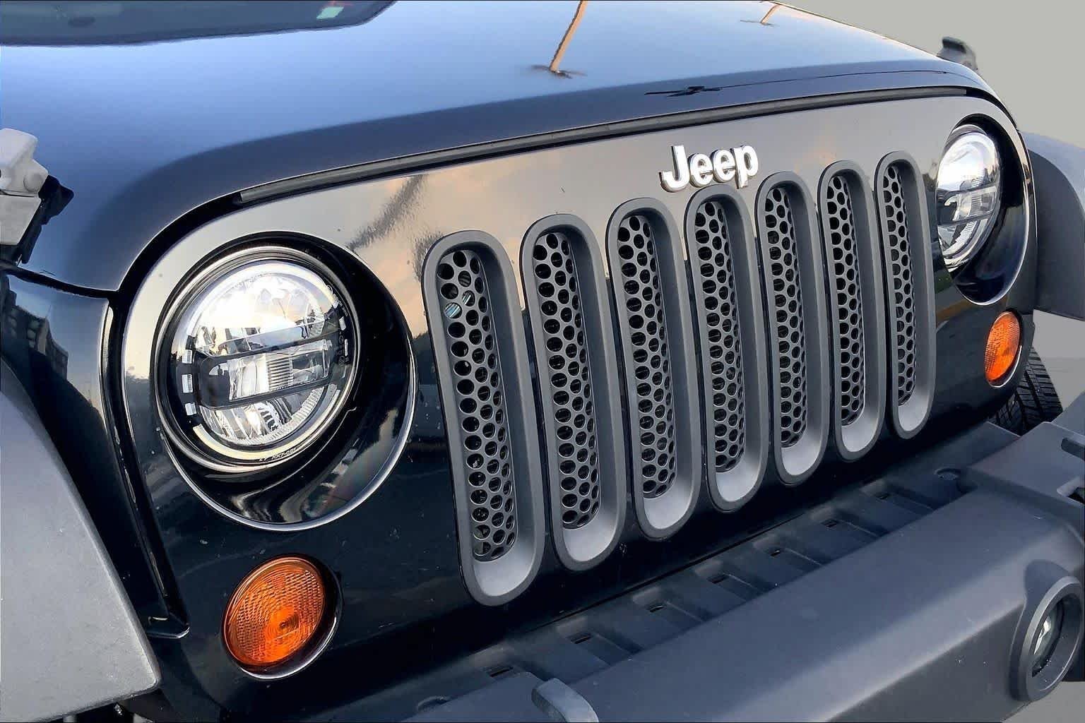 Used 2010 Black Jeep Sport image 26