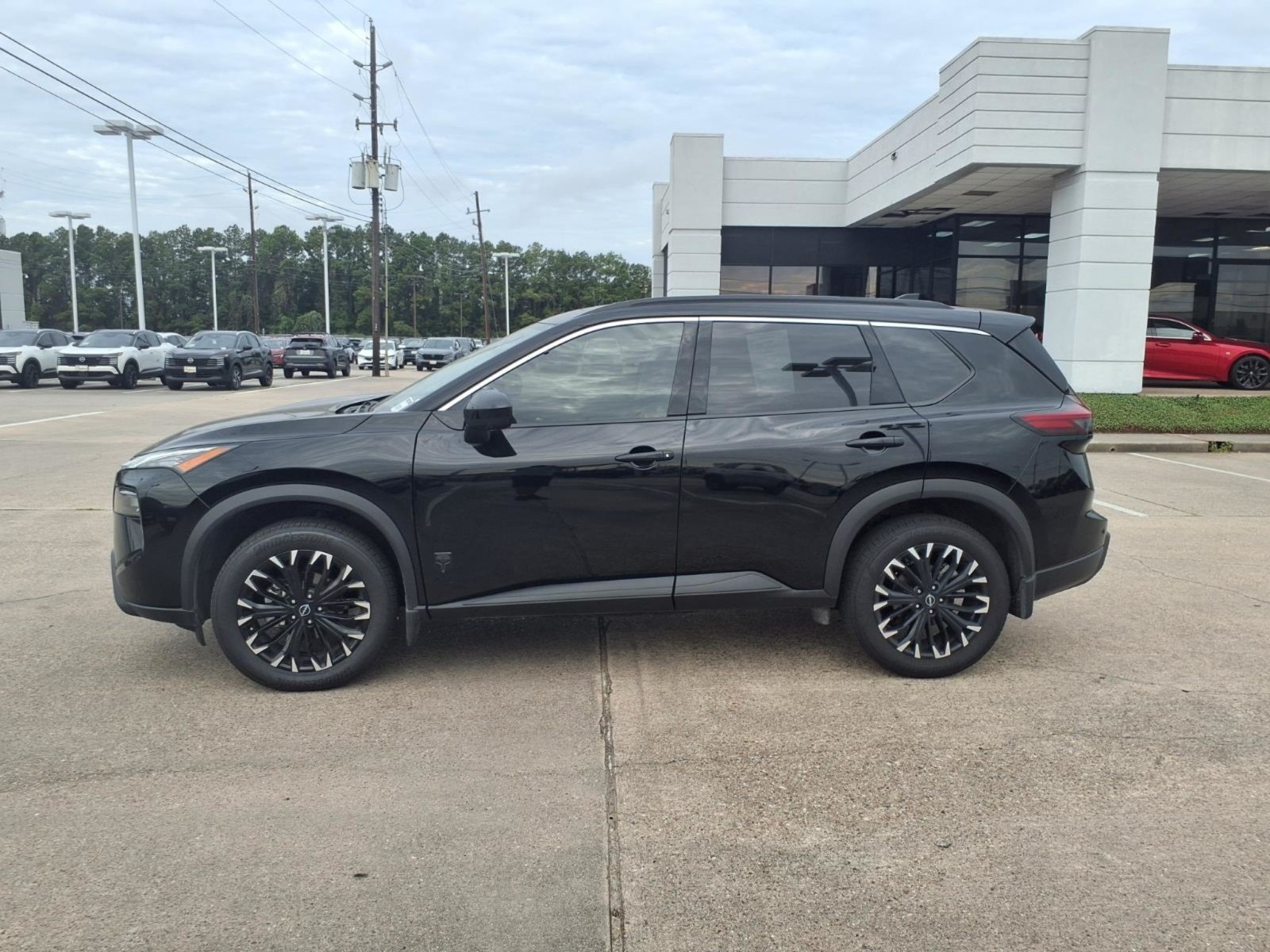 Certified Used 2026 Super Black Nissan Dark Armor image 11