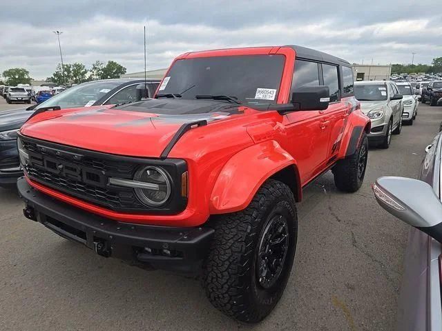 Used 2023 Orange Ford Raptor image 1