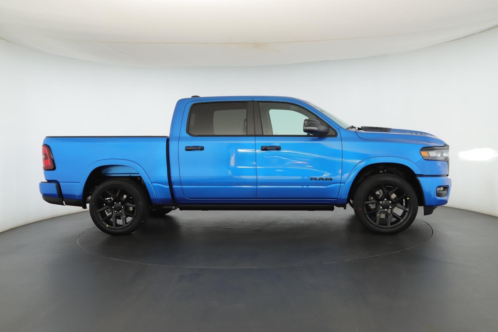 New 2026 Hydro Blue Pearl-Coat Exterior Paint RAM Laramie 4x4 Crew Cab 5