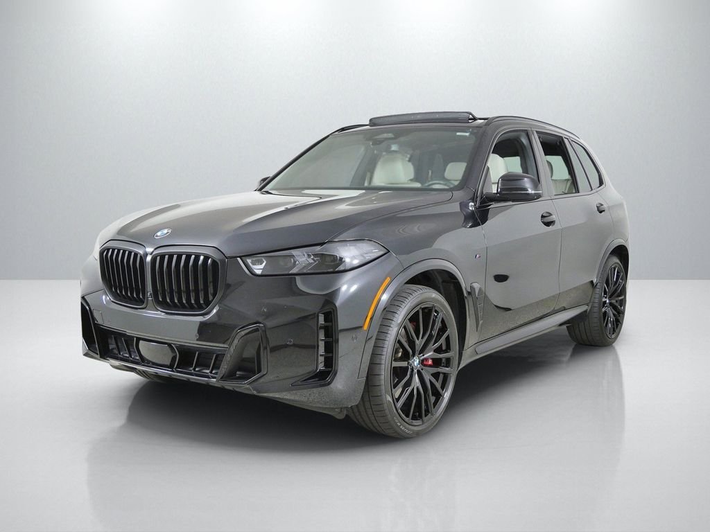 Certified Used 2025 Black Sapphire Metallic BMW xDrive40i image 1