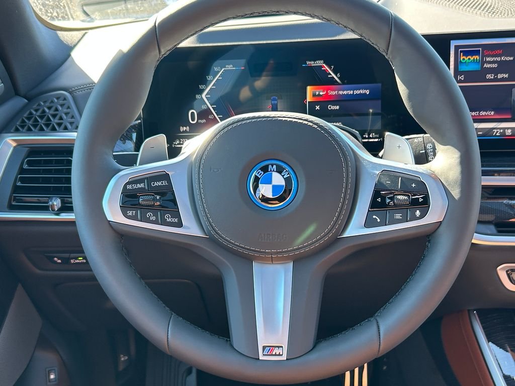 New 2026 Tanzanite Blue II Metallic BMW xDrive50e image 18